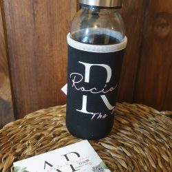 Botella de cristal con funda